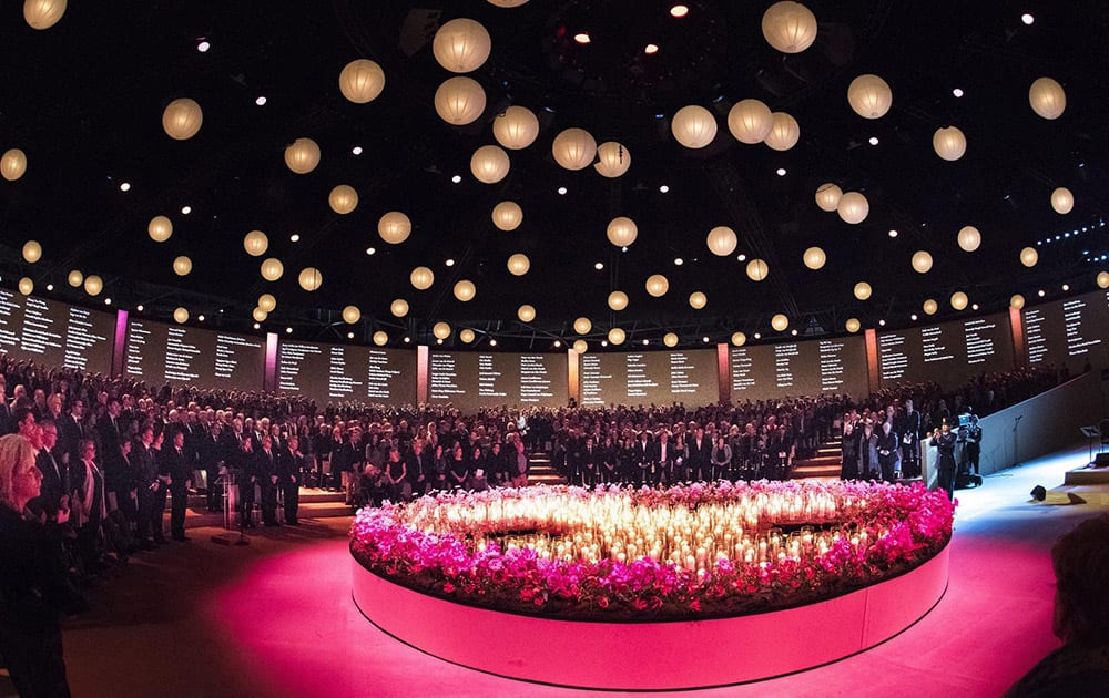 Grieving family members and friends of victims of the Malaysia Airlines Flight 17 disaster gathered around 298 candles representing the victims during a national commemoration ceremony in Amsterdam.