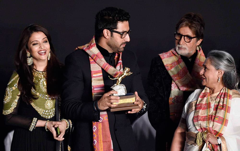 Bollywood actors Amitabh Bachchan, MP Jaya Bachchan, Abhishek Bachchan and Aishwarya Rai Bachchan during inauguration of 20th Kolkata International Film Festival.