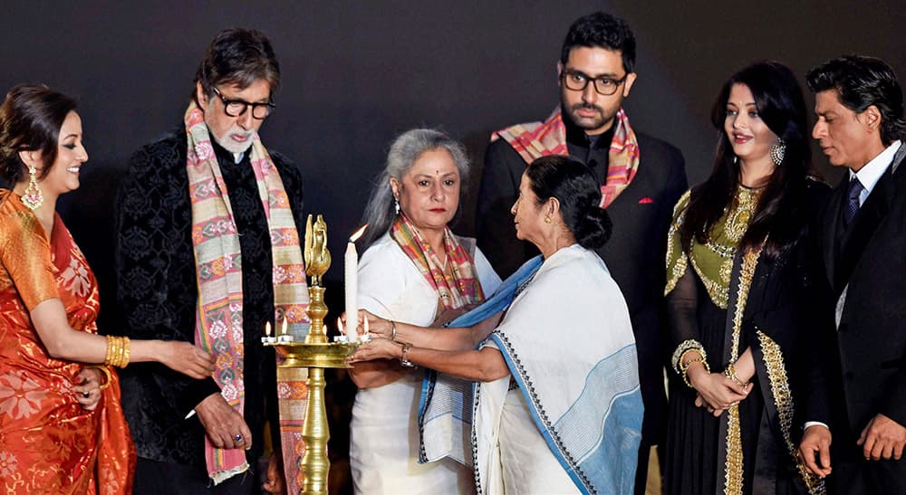 West Bengal Chief Minister Mamata Banerjee (C) along with actors (L-R) Raima Sen, Amitabh Bachchan, MP Jaya Bachchan, Abhishek Bachchan, Aishwarya Rai Bachchan and Shahrukh Khan during inauguration of 20th Kolkata International Film Festival.