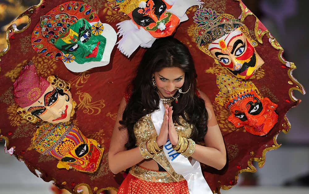 Miss India Jhataleka Malhotra displays the traditional consume during the Miss International Beauty Pageant in Tokyo.