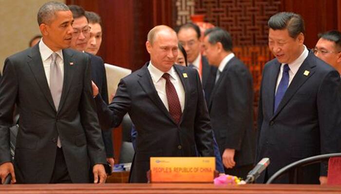 Cold shoulders and effusive smiles in Beijing`s diplomatic wonderland