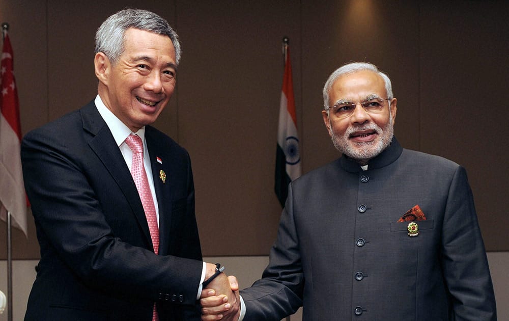 Prime Minister Narendra Modi shakes hands with his Singaporean counterpart Lee Hsien Loong during a meeting at Nay Pyi Taw in Myanmar.