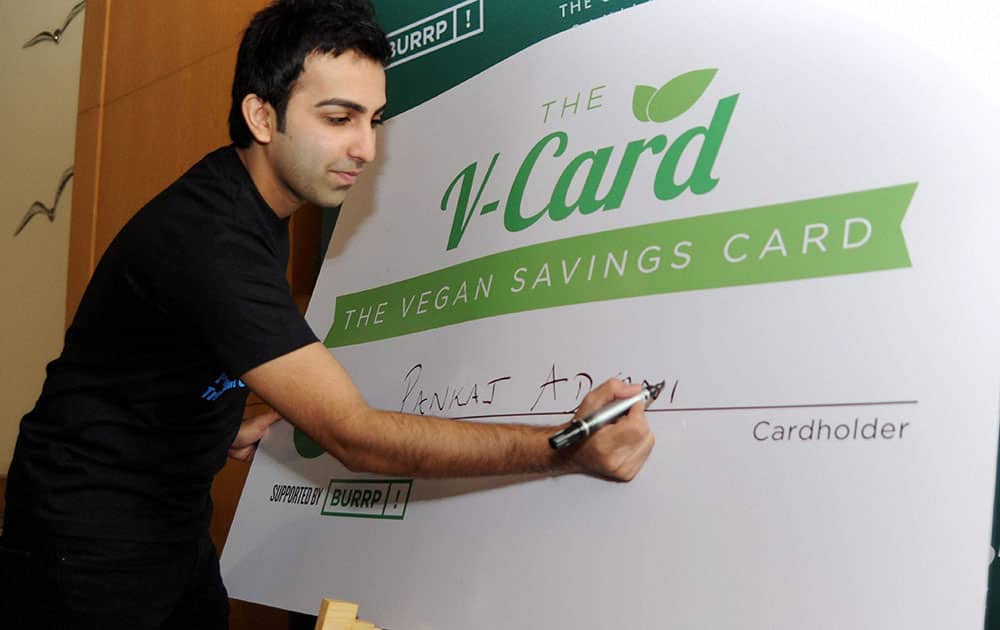World Billiards champion Pankaj Advani launches PETAs V discount Card at an event in Bengaluru.