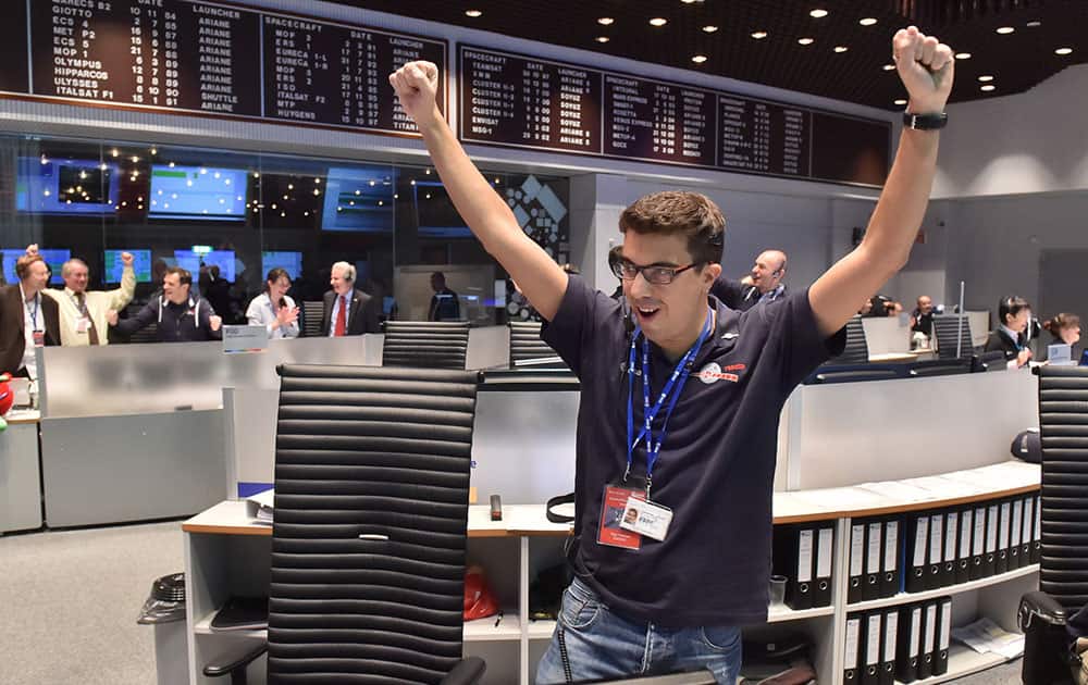 A scientist reacts in the main control room at the European Space Agency after the first unmanned spacecraft Philae landed on the comet called 67P/Churyumov-Gerasimenko, at the control centre in Darmstadt, Germany.