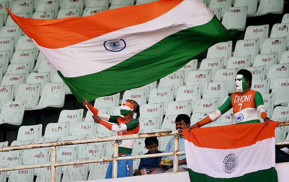 Fans cheer for Team India during 4th ODI match between India and Sri Lanka at Eden Garden in Kolkata.