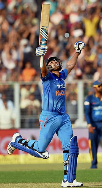 Rohit Sharma celebrates his century during 4th ODI cricket match against Sri Lanka at Eden Garden in Kolkata.