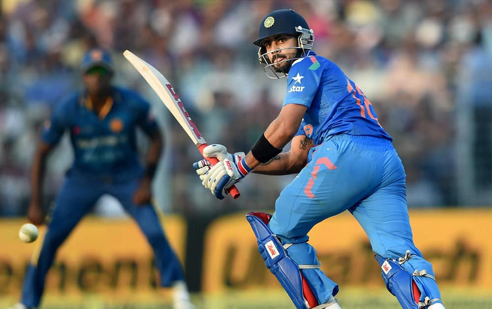 Virat Kohli plays a shot during 4th ODI match against Sri Lanka at Eden Garden in Kolkata.