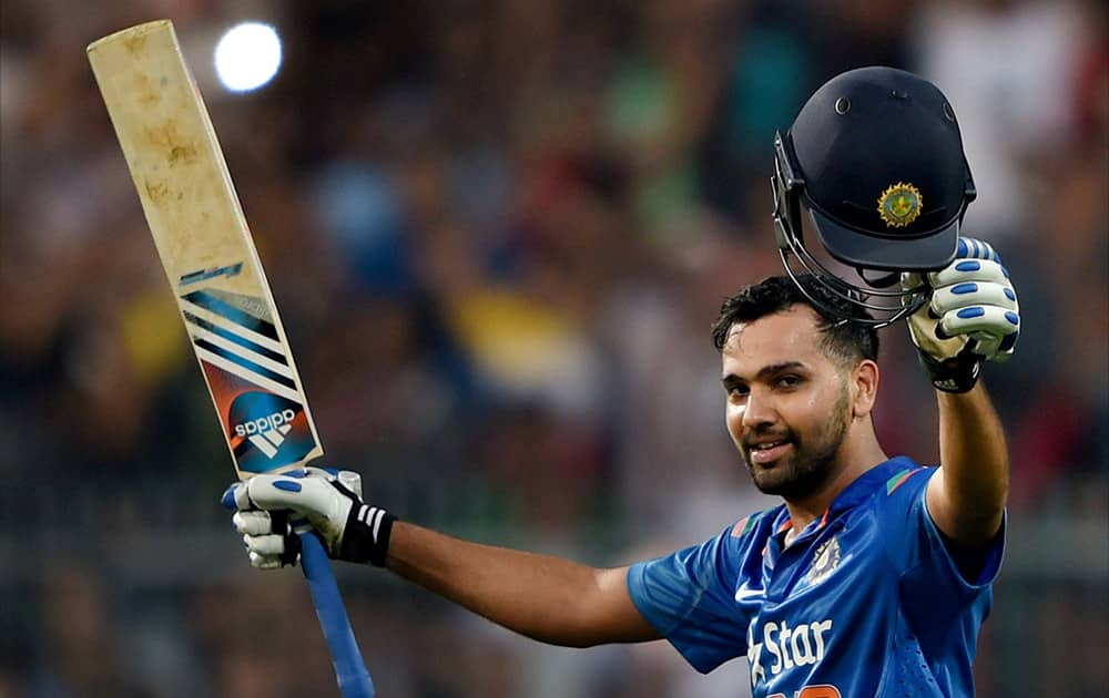 Rohit Sharma reacts after his double century during 4th ODI cricket match against Sri Lanka in Kolkata.