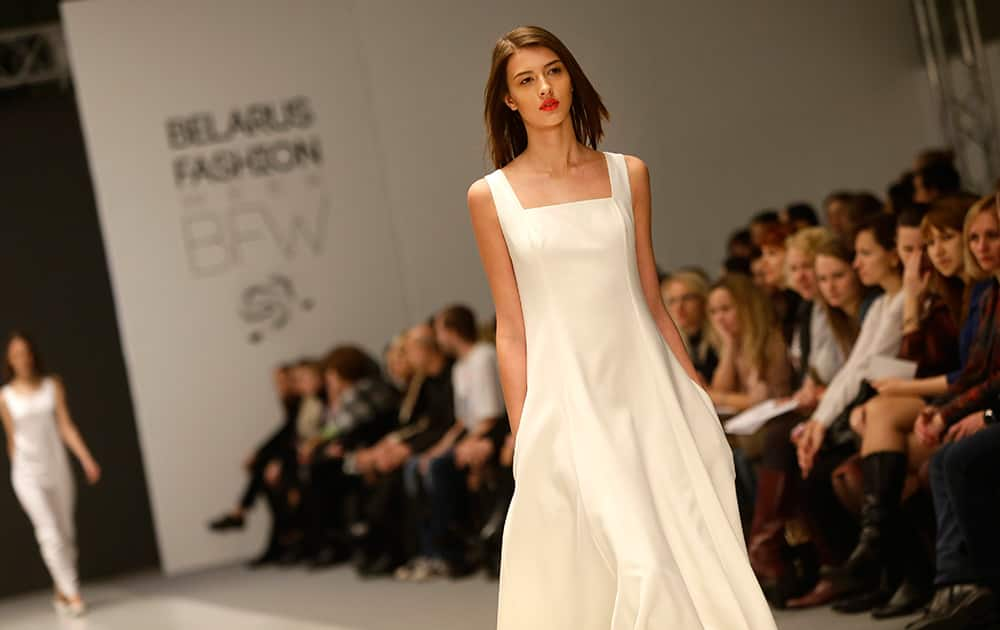 A model displays creation by Belarusian fashion designers Alina and Ulyana Semchenkova at the Belarus Fashion Week in Minsk, Belarus.