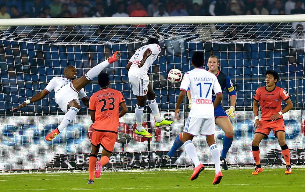 Delhi Dynamos FC and FC Goa (white) players in action during the Indian Super League (ISL) at Jawaharlal Nehru stadium in New Delhi.