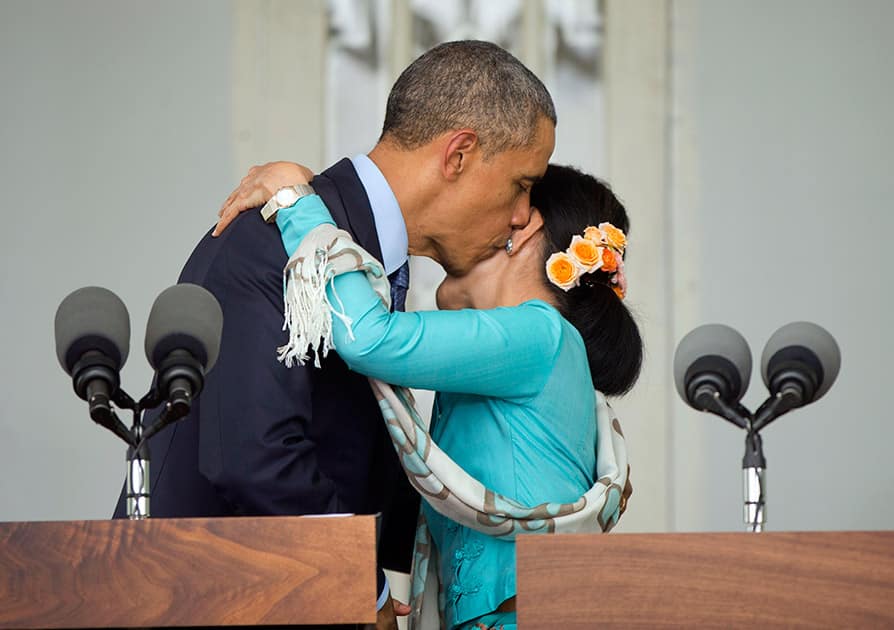 US President Barack Obama, embraces and kisses Myanmar's opposition leader Aung San Suu Kyi during a news conference at her home in Yangon, Myanmar.