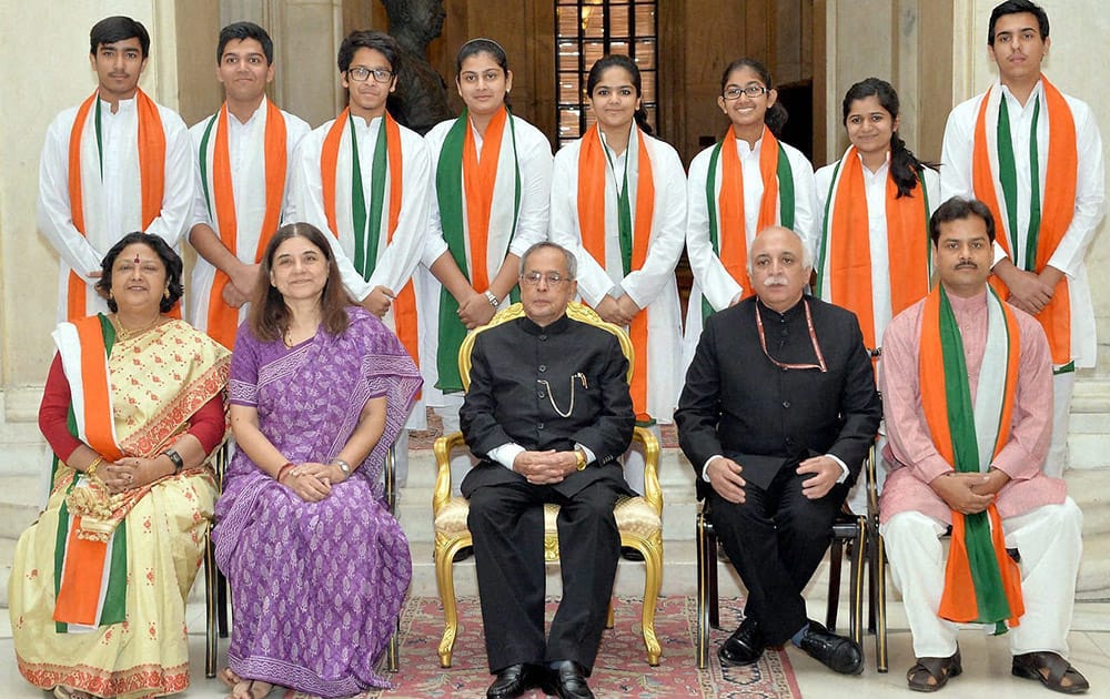 President Pranab Mukherjee and Minister for Women & Child Development Maneka Gandhi during the presentation of National Awards for exceptional children achievers and outstanding work in welfare and development of children on Childrens Day at Rashtrapati Bhavan in New Delhi.