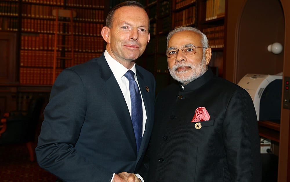 Australia's Prime Minister Tony Abbott and India's Prime Minister Narendra Modi in the Reading Room at Parliament House during the G-20 Leaders' Summit in Brisbane, Australia.