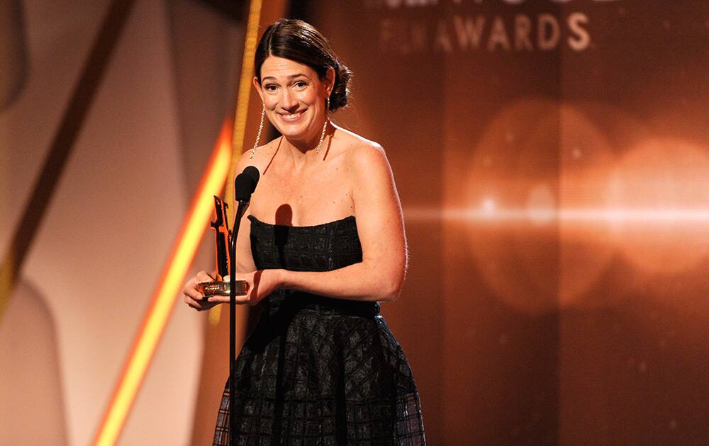 Gillian Flynn accepts the Hollywood screenwriter award for “Gone Girl” on stage at the Hollywood Film Awards at the Palladium in Los Angeles.