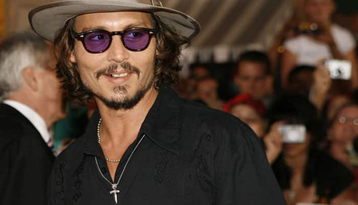 Johnny Depp surprises fiance with a Ferrari