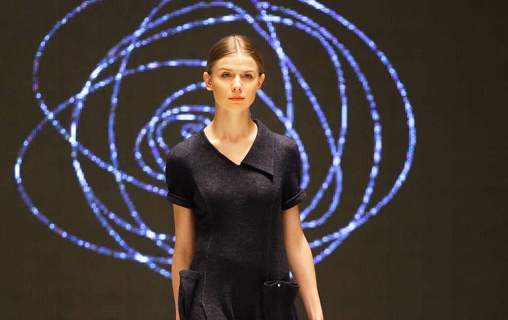 A model displays creation by Belarusian fashion designer Marina Davidova at the Belarus Fashion Week.