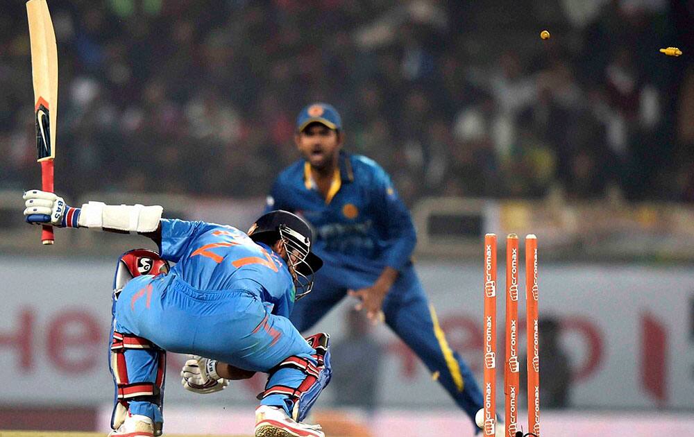 Indian cricketer Ajinkaya Rahane gets clean bowled by Anjelo Mathews during 5th ODI against Sri Lanka in Ranchi.