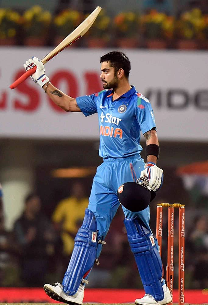 Indian cricket Captain Virat Kohli celebrates his century during 5th ODI aganist Sri Lanka in Ranchi.