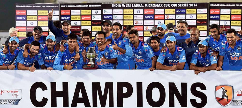 Indian cricketers celebrate with Trophy after winning the series against Sri Lanka in Ranchi.