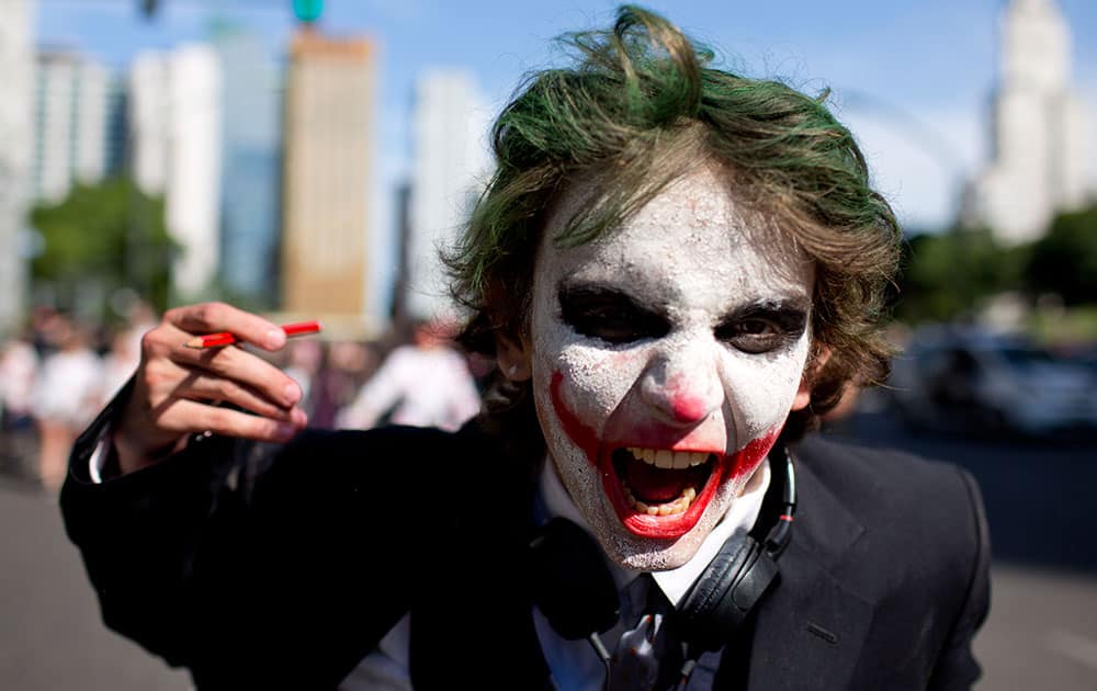 A man dressed as the comic book character The Joker participates in the Argentina Zombie Walk in Buenos Aires, Argentina.