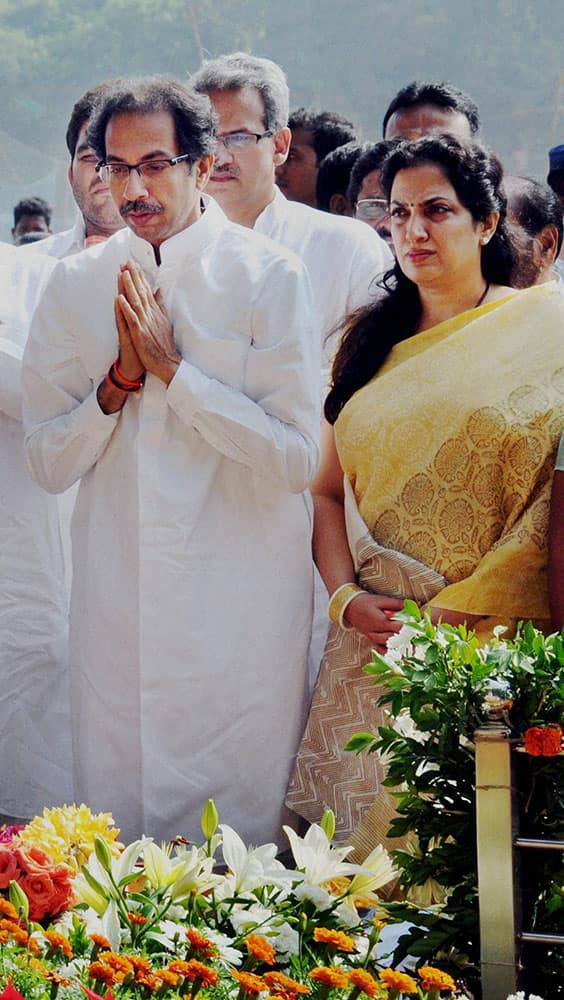 Shiv Sena President Uddhav Thackeray and his wife Rashmi along with Sena leaders paying tributes to his father Balasaheb Thackeray at his memorial on his second death anniversary at Shivaji Park in Mumbai.
