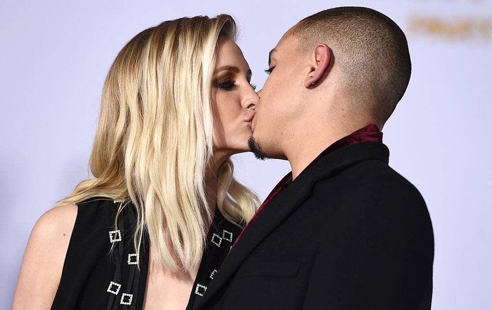 Ashlee Simpson, left, and Evan Ross arrive at the Los Angeles premiere of 