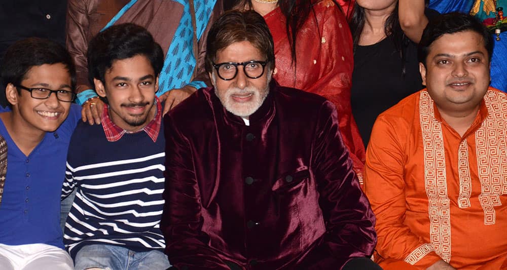 Bollywood megastar Amitabh Bachchan poses with actors during launch of new Bengali film.