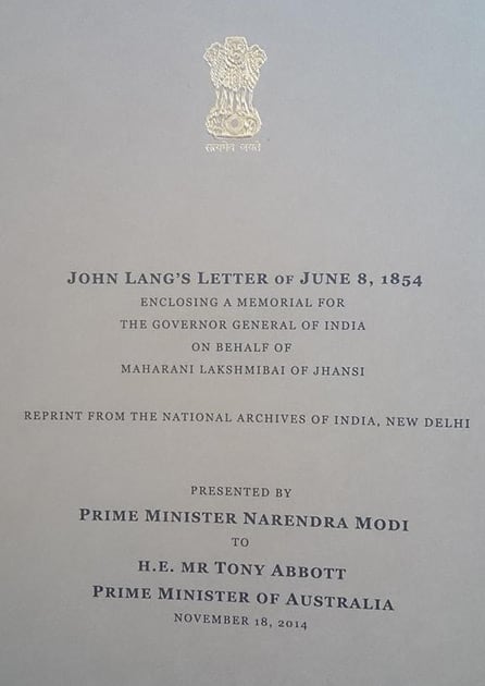 Prime Minister Narendra Modi gifts Australian PM a memorial of Australian John Lang on behalf of Rani of Jhansi against East India Company.