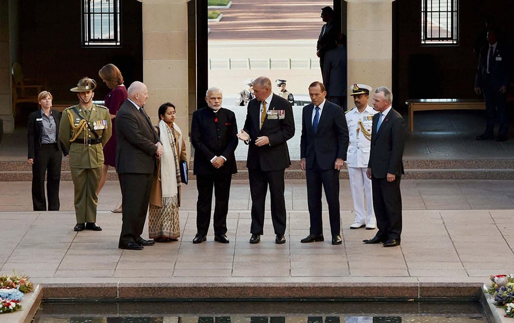 Prime Minister Narendra Modi with his Australian counterpart Tony Abbott during a visit to Australian War Memorial in Canberra.