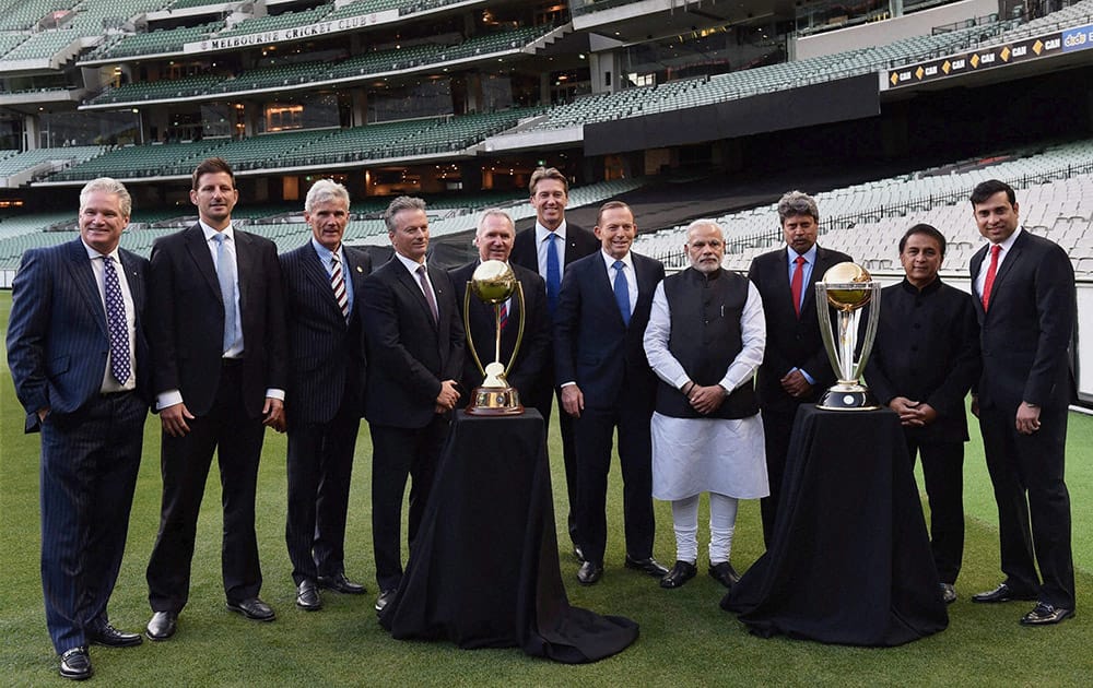Prime Minister Narendra Modi and his Australian counterpart Tony Abbott with legendary cricketers of both countries during a function at Melbourne Cricket Ground in Melbourne.