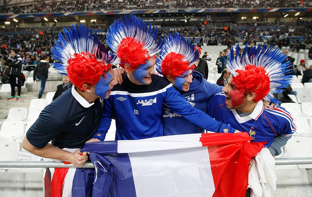 France supporters wave a flag, during an international friendly soccer match between France and Sweden, at the Velodrome Stadium, in Marseille, southern France.