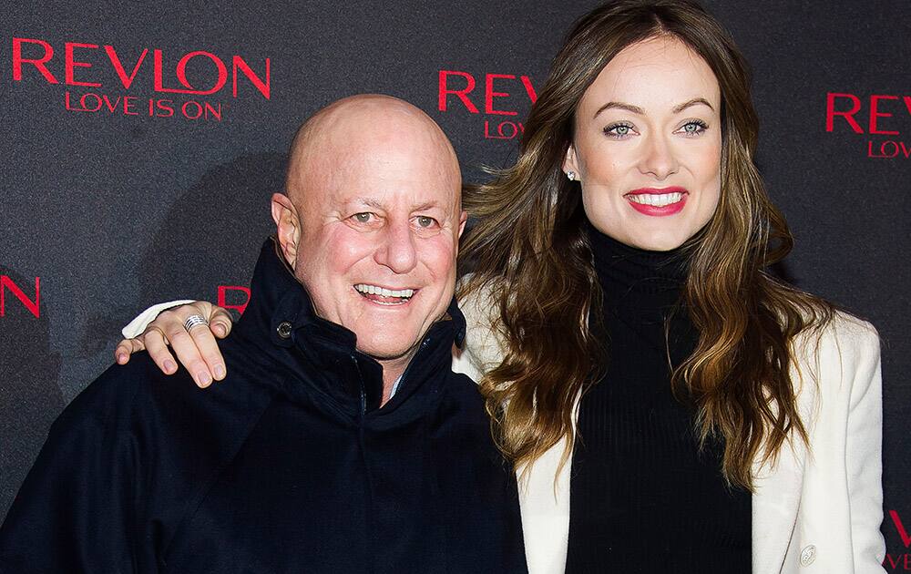 Ron Perelman, left, and Olivia Wilde unveil the 