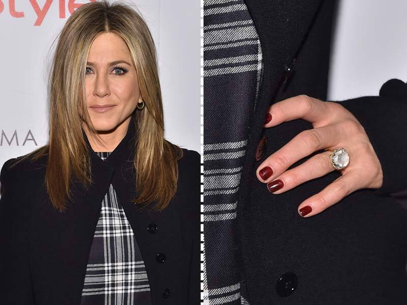 Jennifer Aniston spotted with her enormous engagement ring at the screening of her upcoming movie Cake.