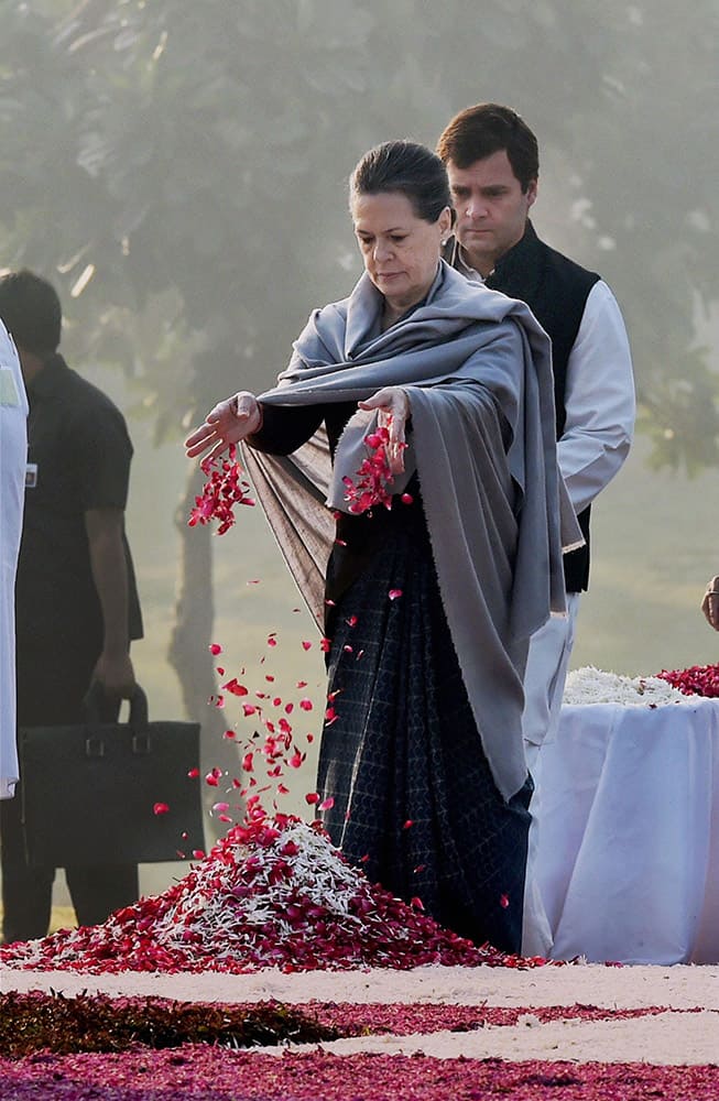 Congress President Sonia Gandhi with party Vice-President Rahul Gandhi paying homage to former Prime Minister Indira Gandhi on her 97th birth anniversary at Shakti Sthal in New Delhi.