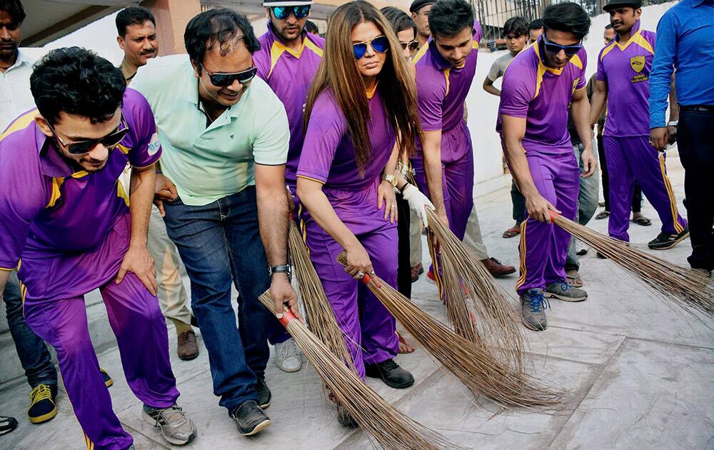 Bollywood actress Rakhi Sawant takes part in a cleansing drive program at Samadhi Sthal of Indias first President Rajendra Prasad in Patna