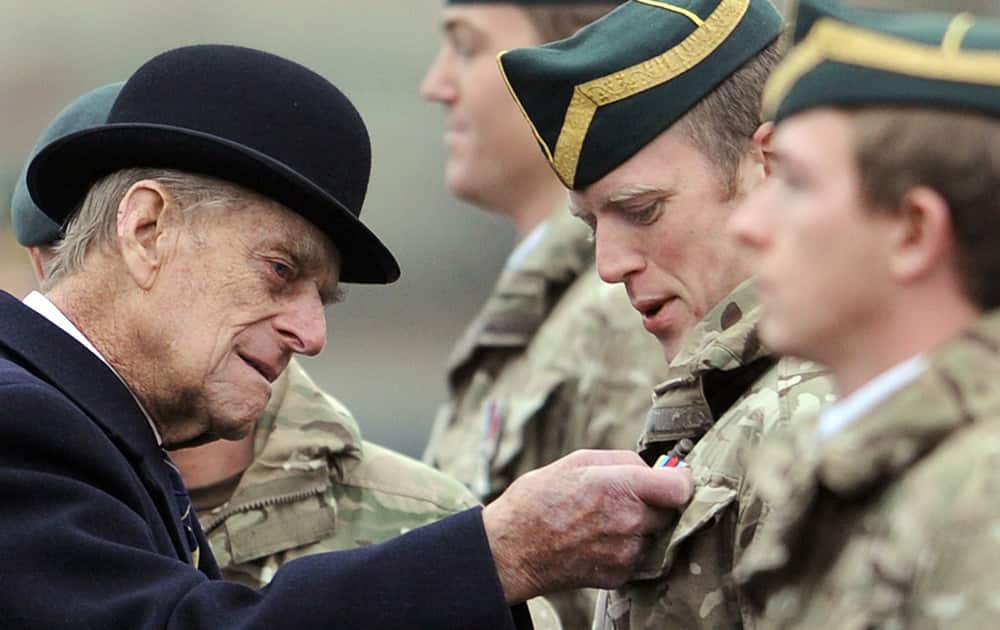 Britain's Prince Philip visits the armored regiment of the Queen's Royal Hussars in Paderborn, Germany. He awarded the soldiers who just returned from south Afghanistan for their service. 