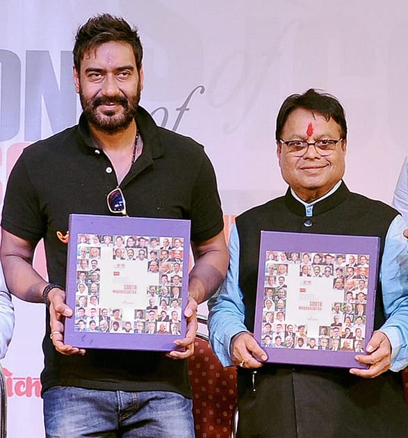 Ajay Devgn, Lokmat Group chairman and MP Vijay Darda during a function for the release of a coffee table book on Icons of South Maharashtra in Kolhapur.