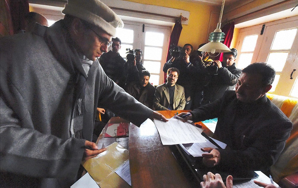 Jammu and Kashmir Chief Minister and National Conference working president Omar Abdullah filling nomination papers for Assembly elections at Beerwah in Budgam district.