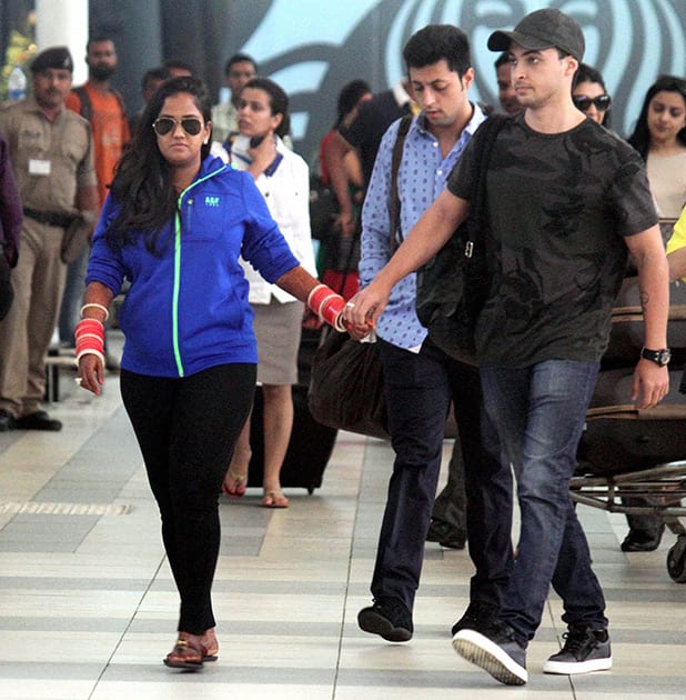 Newly wed couple Arpita Khan and Aayush Sharma come at domestic airport Santacruz in Mumbai after their wedding in Hyderabad. 