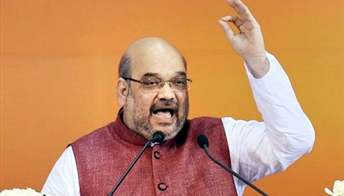 Teach two ruling families in J&amp;K a lesson: BJP chief Amit Shah to voters