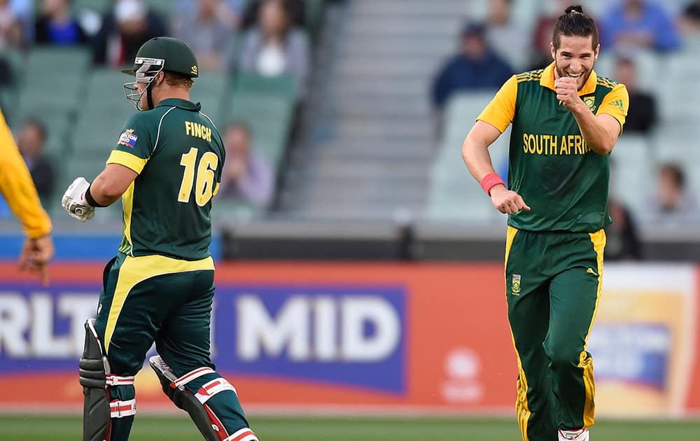 South Africa's Wayne Parnell, celebrates the wicket of Australia's Aaron Finch, during the fourth one day international cricket match in Melbourne, Australia.