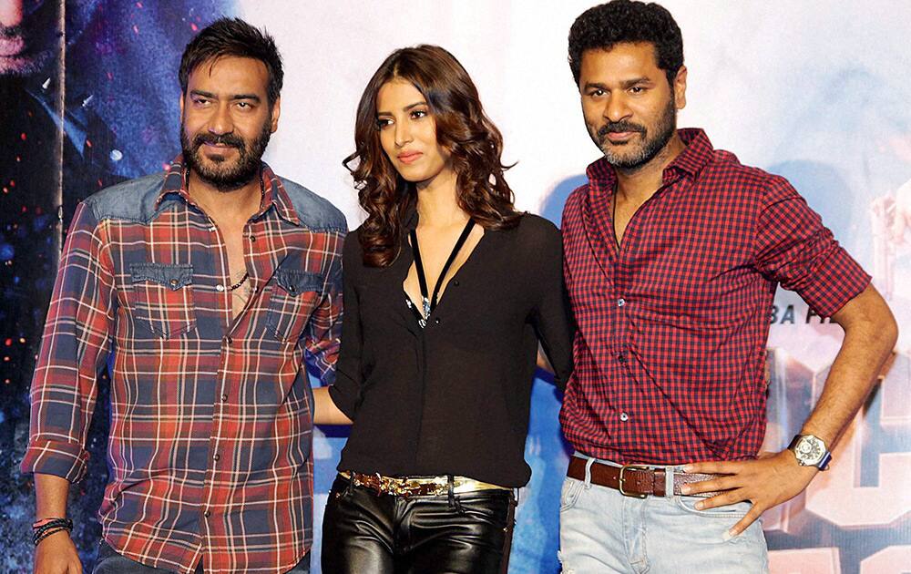 Ajay Devgn, Manasvi Mamgai and filmmaker Prabhu Deva during the song launch of film Action Jackson in Mumbai.