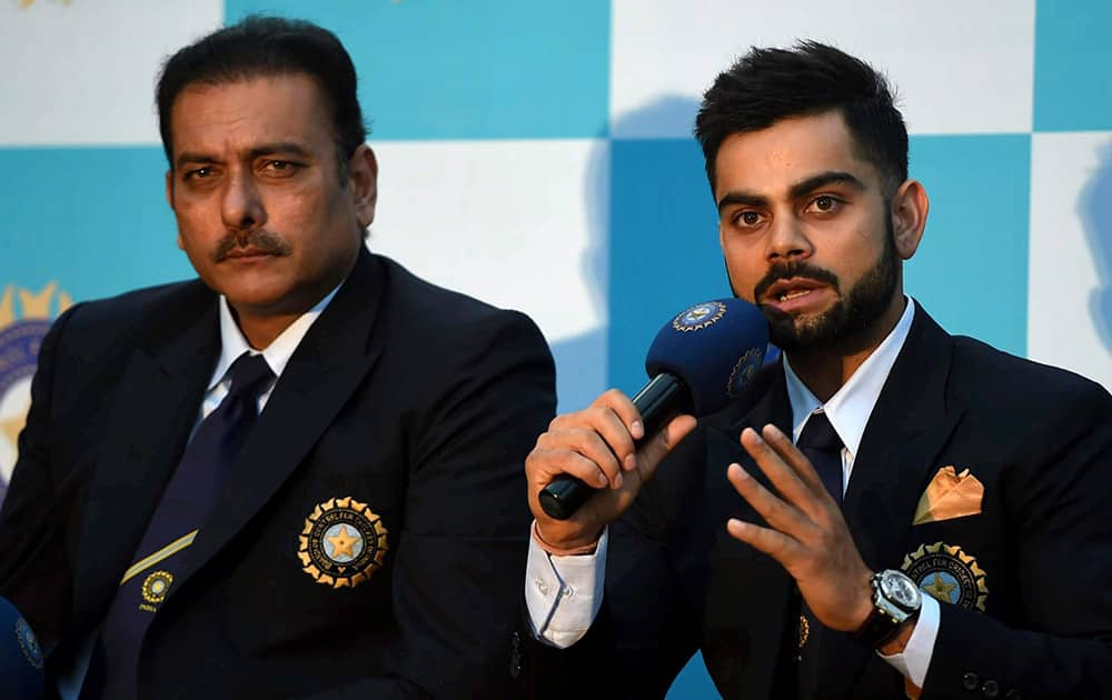 Director cricket Ravi Shastri and skipper Virat Kohli at a pre-departure conference before the team leaves for the Australia tour, in Mumbai.