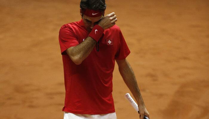 Davis Cup Final: Beaten Roger Federer consoled by shaking &quot;ghost&quot; off his back 