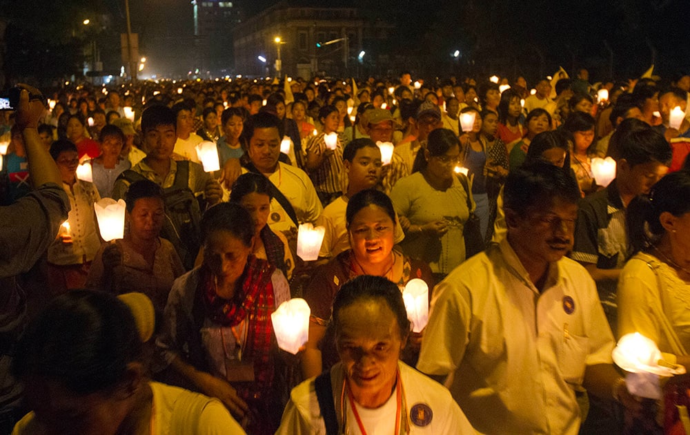 Myanmar Christians holding candles walk as they take part in a ceremony to mark the 500th anniversary of the Roman Catholic Church’s arrival to Myanmar at Saint Mary Cathedral, in Yangon, Myanmar.