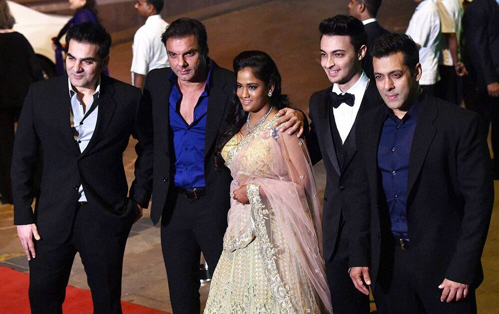 Bollywood actor Salman Khan along with brother Arbaz, Sohail, sister Arpita and her husband Aayush Sharma during the Arpita Khan wedding reception in Mumbai.