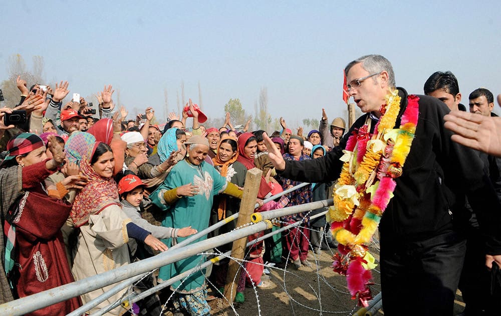 Jammu and Kashmir Chief Minister and National Conference working president Omar Abdullah with supporters at a rally in Bandipura