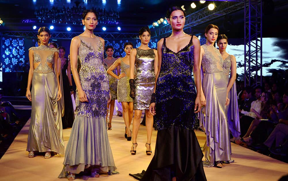 Models displays a creation by designer Rocky Star during the Blenders Pride Fashion Tour 2014 in Gurgaon.	