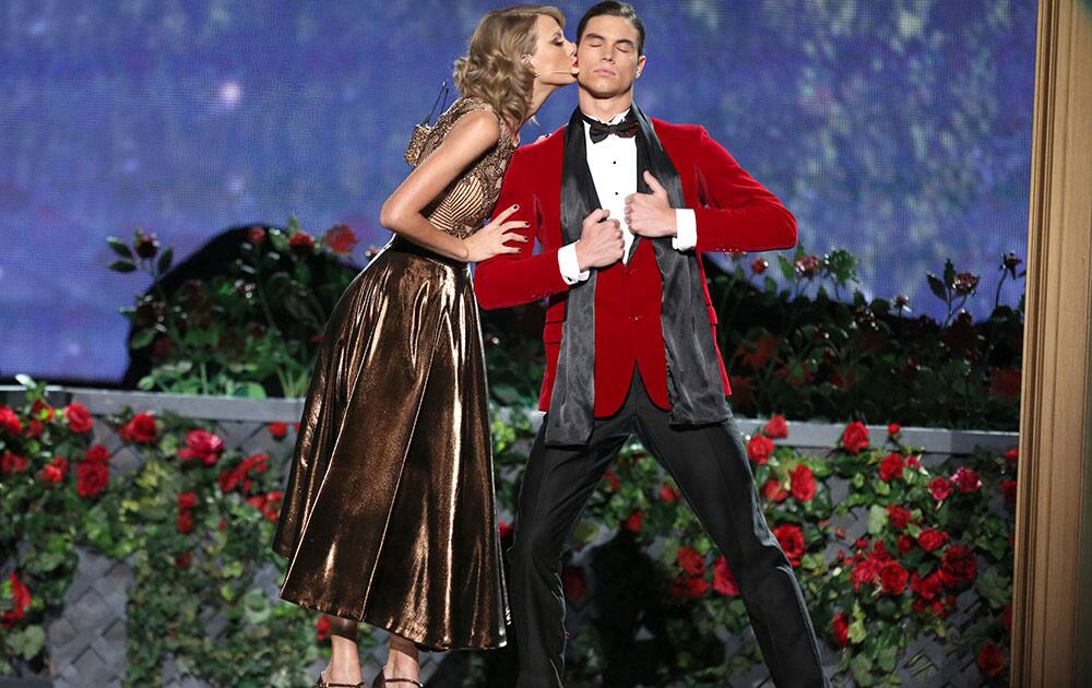 Taylor Swift performs on stage at the 42nd annual American Music Awards at Nokia Theatre L.A.