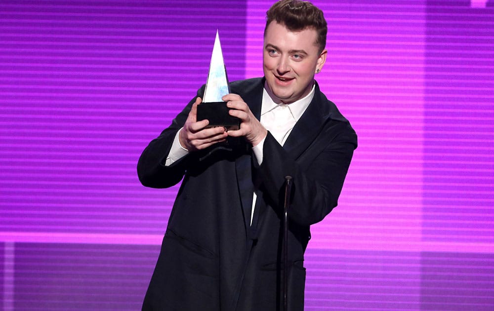 Sam Smith accepts the award for favorite pop/rock male artist at the 42nd annual American Music Awards at Nokia Theatre L.A.